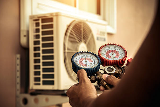 Professional Hvac technician working in Hurdle Mills, NC
